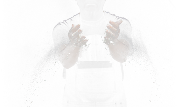 Chef prepare white flour dust for cooking bakery food. Elderly man Chef clap hand, white flour dust explode fly in air. Flour stop motion in air with freeze high speed shutter, black background