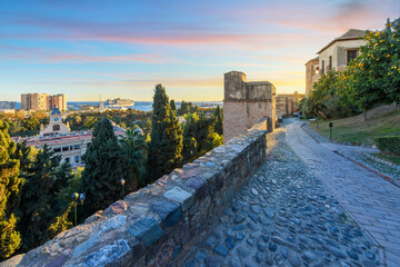 Sunset view from the 11th century Moorish Alcazaba fortification overlooking the medieval old town,...