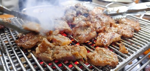 Charcoal grilled pork ribs enjoyed by Koreans
