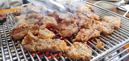 Charcoal grilled pork ribs enjoyed by Koreans