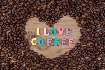 The inscription I love coffee on coffee beans