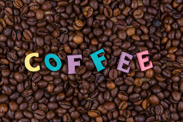 The inscription coffee on coffee beans