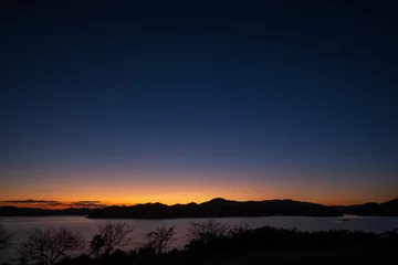 Foto op Canvas 日本の岡山県備前市の頭島の美しい星空 © 仁 藤原