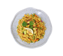 Tasty rice with meat and vegetables in plate isolated on white, top view