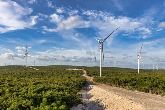 Landscape with Turbine Green Energy Electricity, Windmill for electric power production, Wind turbines generating electricity on rice field at Binh Thuan, Vietnam. Clean energy concept.