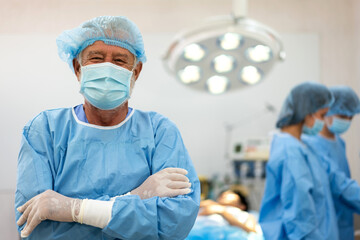 Professional anesthesiologist doctor medical team preparing patient to gynecological surgery...