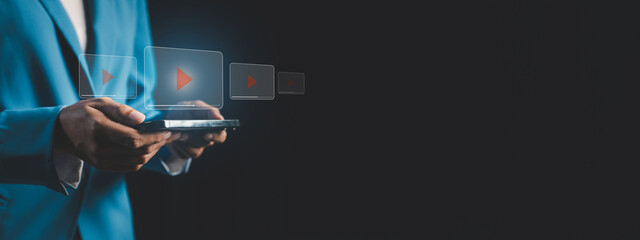 Concepts of watching video clips from video clip hosting service platforms, watching entertainment media on websites or applications, uploading video clips to earn money from the platform.