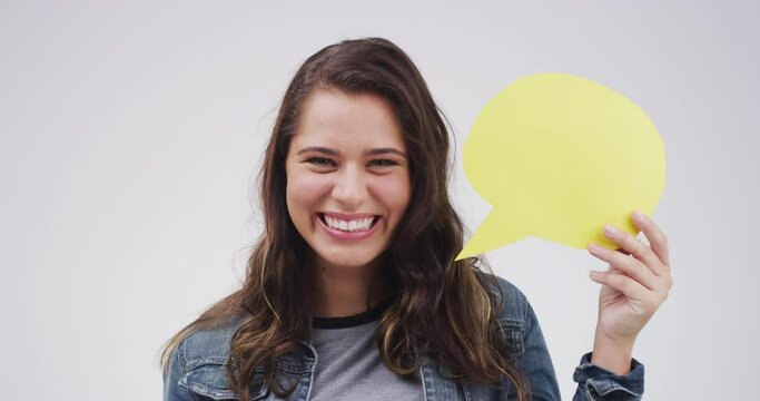 Happy woman, speech bubble and poster mockup for education, language and translation FAQ in portrait on a white background. Face of excited student with voice, wow and chat or social media in studio