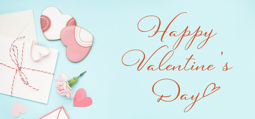 Fototapeta na wymiar Greeting banner for Valentine's Day with sweet cookies, flower and envelopes