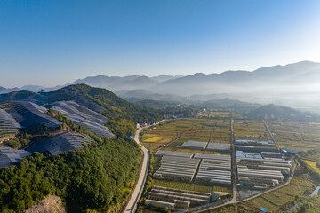Aerial photography of solar photovoltaic panels on the mountain
