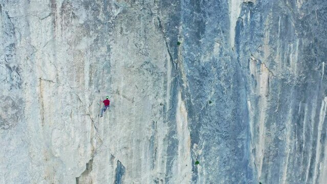 A Daredevil's Ascent: Conquering the Majestic Mountain Heights with Grit and Determination