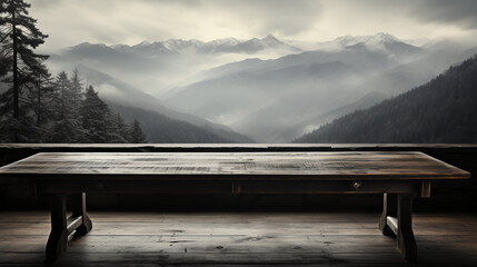 Table in empty room with large windows - snow on mountains in background - rustic - country - vacation - getaway - travel 