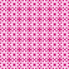 A shocking pink floral seamless pattern on a light pink background