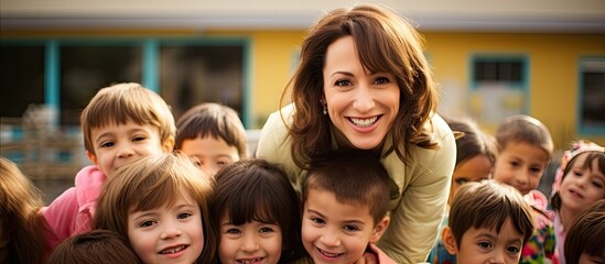 Obraz premium Preschool teacher embracing kindergartners and relishing return to school.