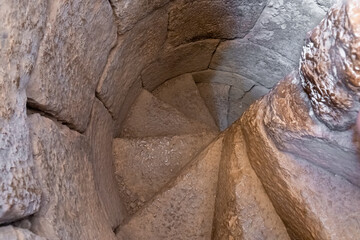Stone  spiral staircase in a tower in the medieval fortress of Nimrod - Qalaat al-Subeiba, located near the border with Syria and Lebanon in the Golan Heights, northern Israel