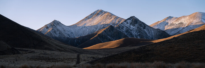 New Zealand landscape panorama at sunset of mountains