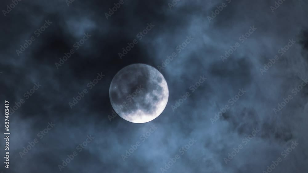 Wall mural mesmerising time lapse of clouds and full moon. perfect for mystical and atmospheric content. close-