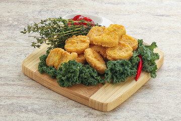 Crispy chicken nuggets with tomato ketchup