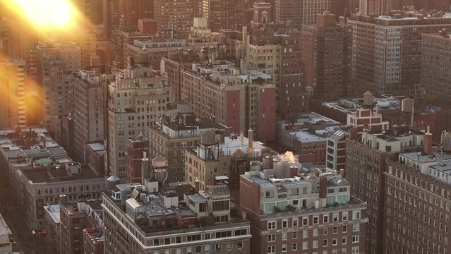 Aerial shot of the Upper East Side of Manhattan at sunrise.