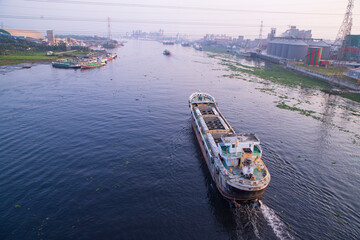 Aerial view Landscape of Sand bulkheads ships with Industrial zone in Sitalakhya River, Narayanganj, Bangladesh