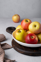 Beautiful ripe apples on a plate. Selective focus.
