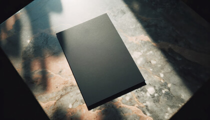 Elegant cafe table with black menu mockup on marble surface in sunlight. Sophisticated presentation concept. Generative AI