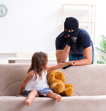 Child trafficking and abuse concept with small girl