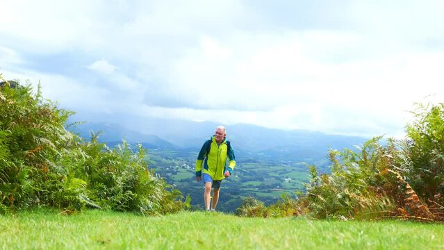 Mature man hiking on 'La Rhune' in the French Basque Country