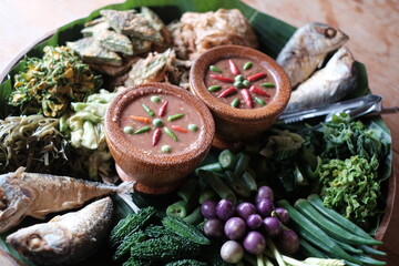 Spicy shrimp paste dip still life with dried fruits and vegetables, Thailand food