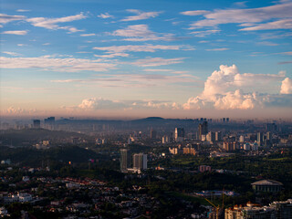 Fototapeta premium Aerial Hyperlapse of Kuala lumpur city with Luxury high rise condominium overseeing Kuala lumpur city during morning