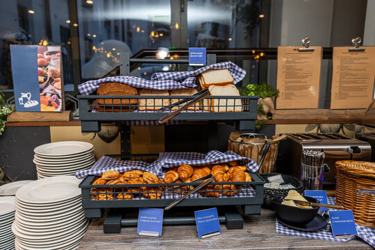 Artisan Bread and Fresh Pastries Display at a Cozy Breakfast Buffet in hotel