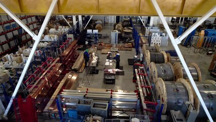 Storehouse for various elements of equipment at assembly plant. Spare parts for equipment in industrial park kept in huge warehouse