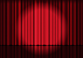 Red curtain background. Spotlight on stage curtain. Theatrical drapes. Wavy velvet background.