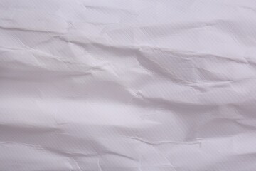 Texture of crumpled parchment paper as background, top view