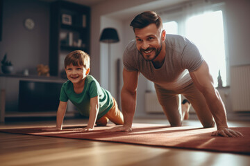 father and son share a playful moment doing push ups together at home