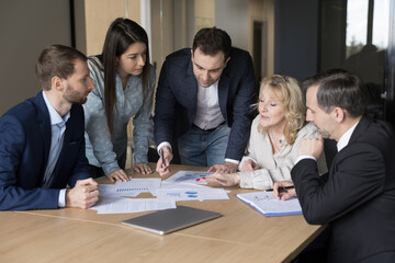 Business team working at corporate briefing, review sales results, forecasting and planning start...