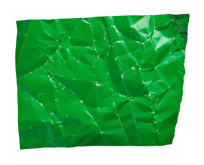 Green crumpled paper with folds texture cut out on transparent background