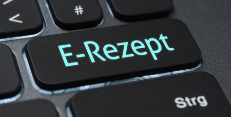 Beleuchtete Tastatur mit einer beschrifteten Taste - E-Rezept - 687456256