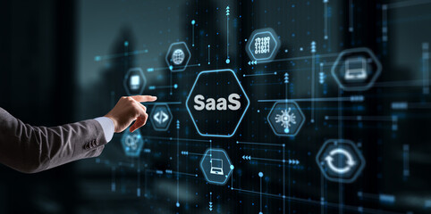 SaaS software as a service concept with hand pressing a button - Powered by Adobe