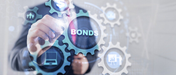 Businessman clicks inscription bonds. Bond Finance Banking Technology Gears concept