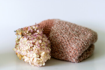 knitted work on a white background, knitted texture, needlework