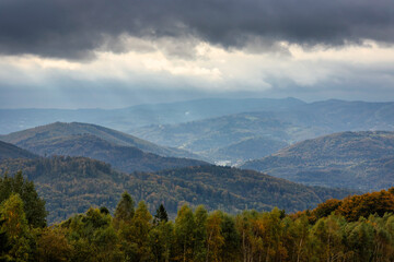 Mountain landscape under steel clouds