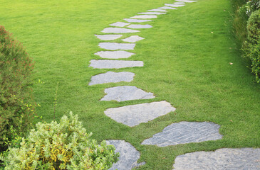Garden stone pathway curve pattern background.
