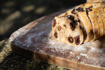 The Cutting French Olive baguette. Outdoor. Sunbeam. Copy space.