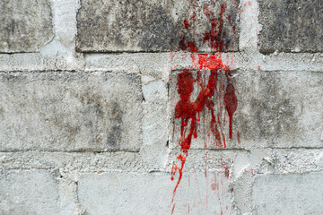 brick wall with blood splatter. murder illustration photo concept