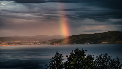 Enchanting Rainbow Across Trondheim's Scenic Fjord