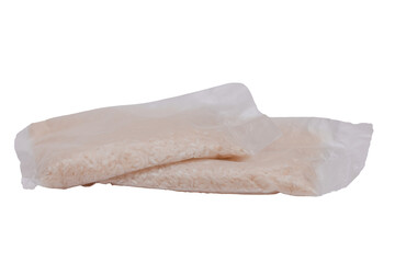 A Plastic Bags of White Long Grain Rice - Isolated on White Background. Small Transparent Packages with Dry Rice - Isolation
