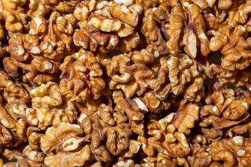 Scattered Shelled Walnuts. Background from Walnut. Natural High-Calorie Snacks