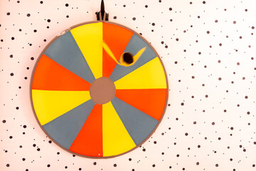 toy target with arrow on wall