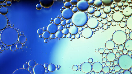 Abstract Colorful Food Oil Drops Bubbles and spheres Flowing on Water Surface